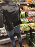 Candid skinny ass in jeans caught in supermarket