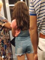 Kid in jeans short with nice ass