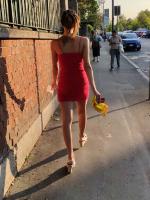 Girl in red dress with nice ass walking