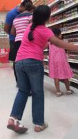 Mexican girls in sandals - supermarket