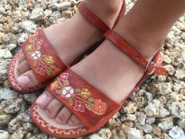 Mexican girls in sandals - closeup
