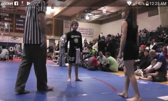 Girl vs boy wrestling, grappling
