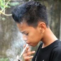 Western Borneo boys smoking  3