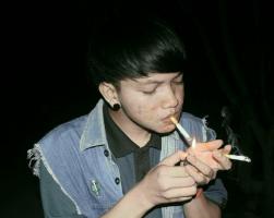 Indonesian boys smoking double