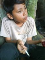 Indonesian boys smoking  18