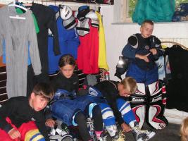 little boys hockey players in the cabin