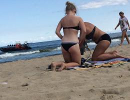 Teen butts on beach