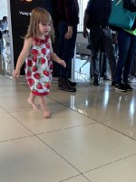 Little girl in diaper at the airport